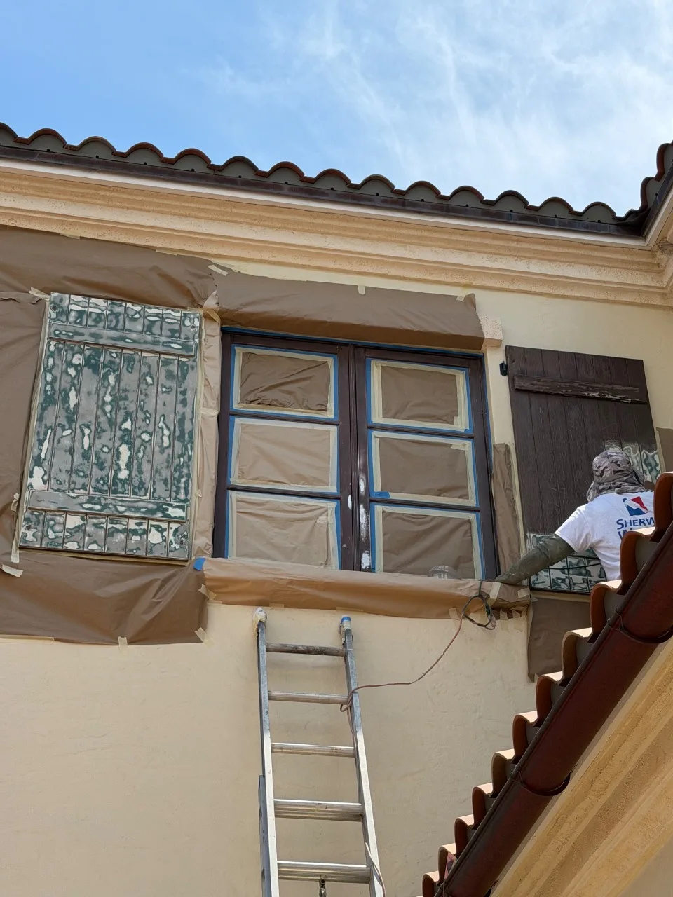 Metal windows electrostatic finish and shutters woodgrain.